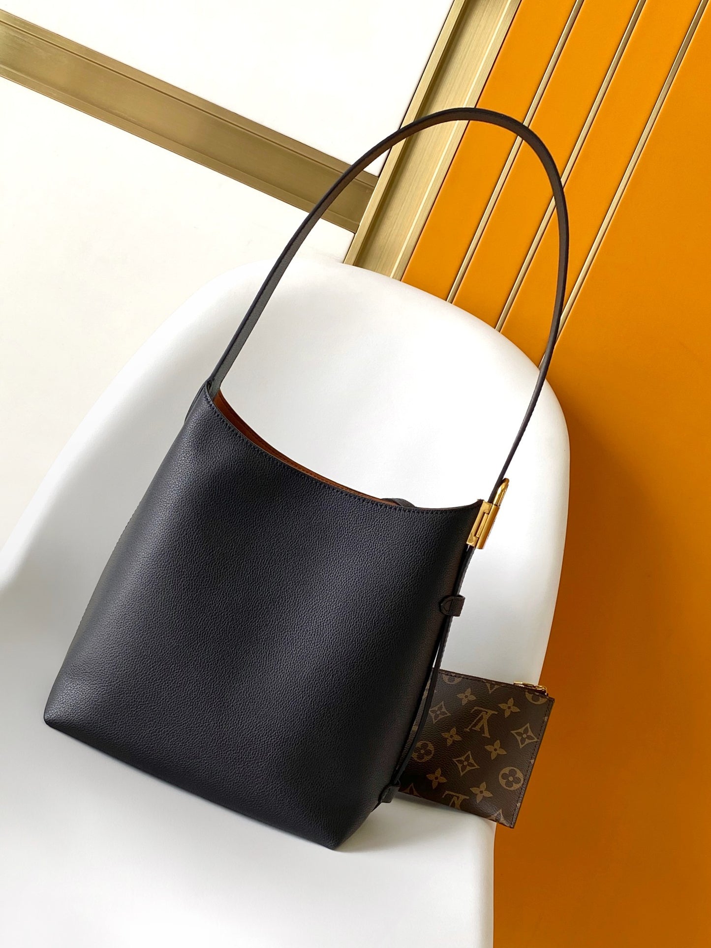 Louis Vuitton Minimalist Black Leather Hobo Shoulder Bag with Gold Accent