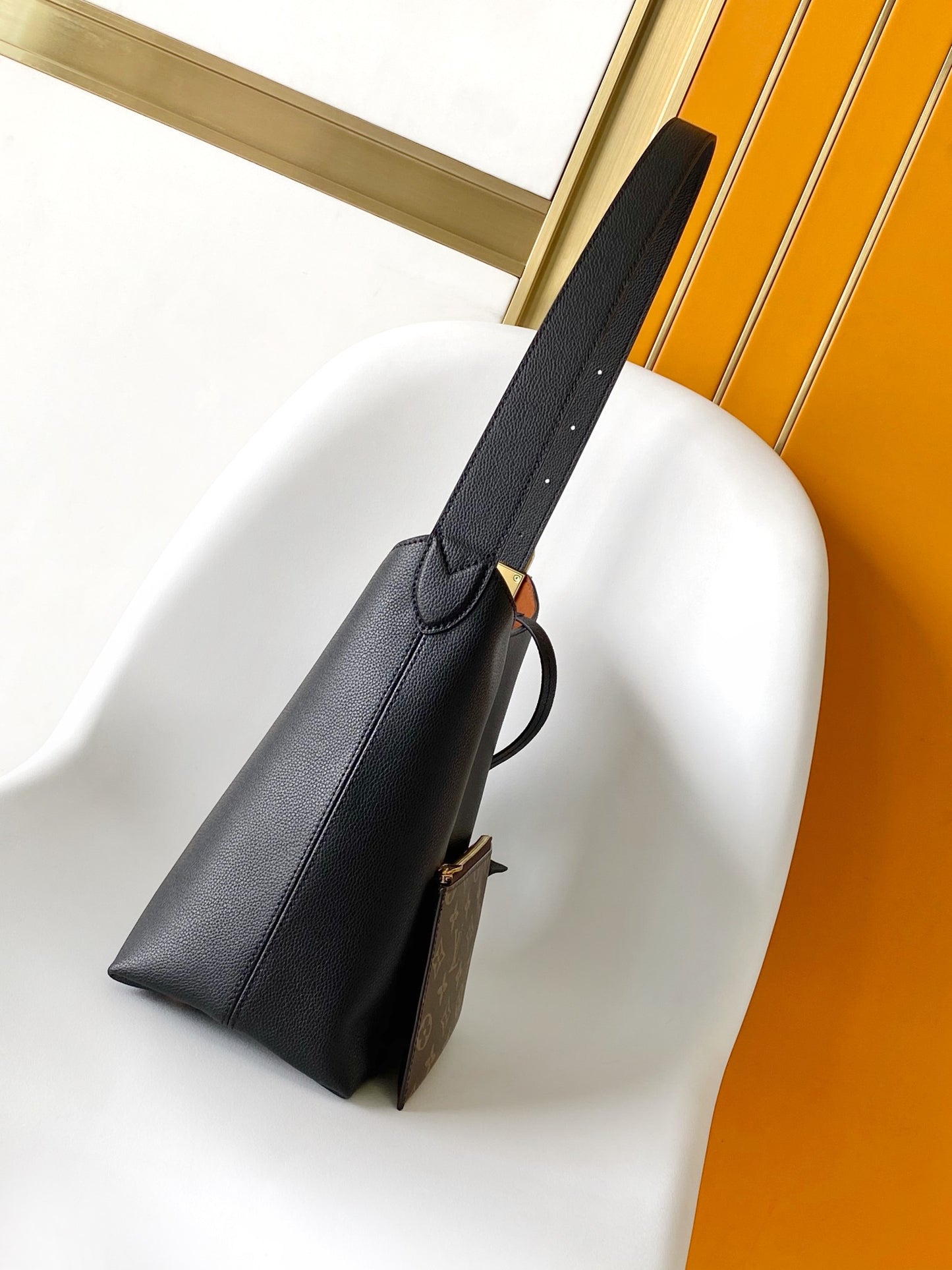 Louis Vuitton Minimalist Black Leather Hobo Shoulder Bag with Gold Accent
