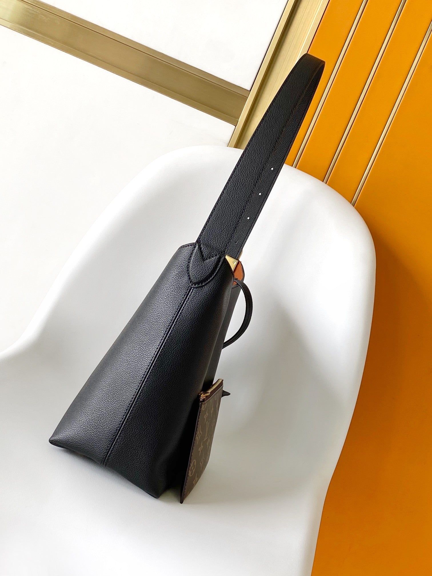 Louis Vuitton Minimalist Black Leather Hobo Shoulder Bag with Gold Accent