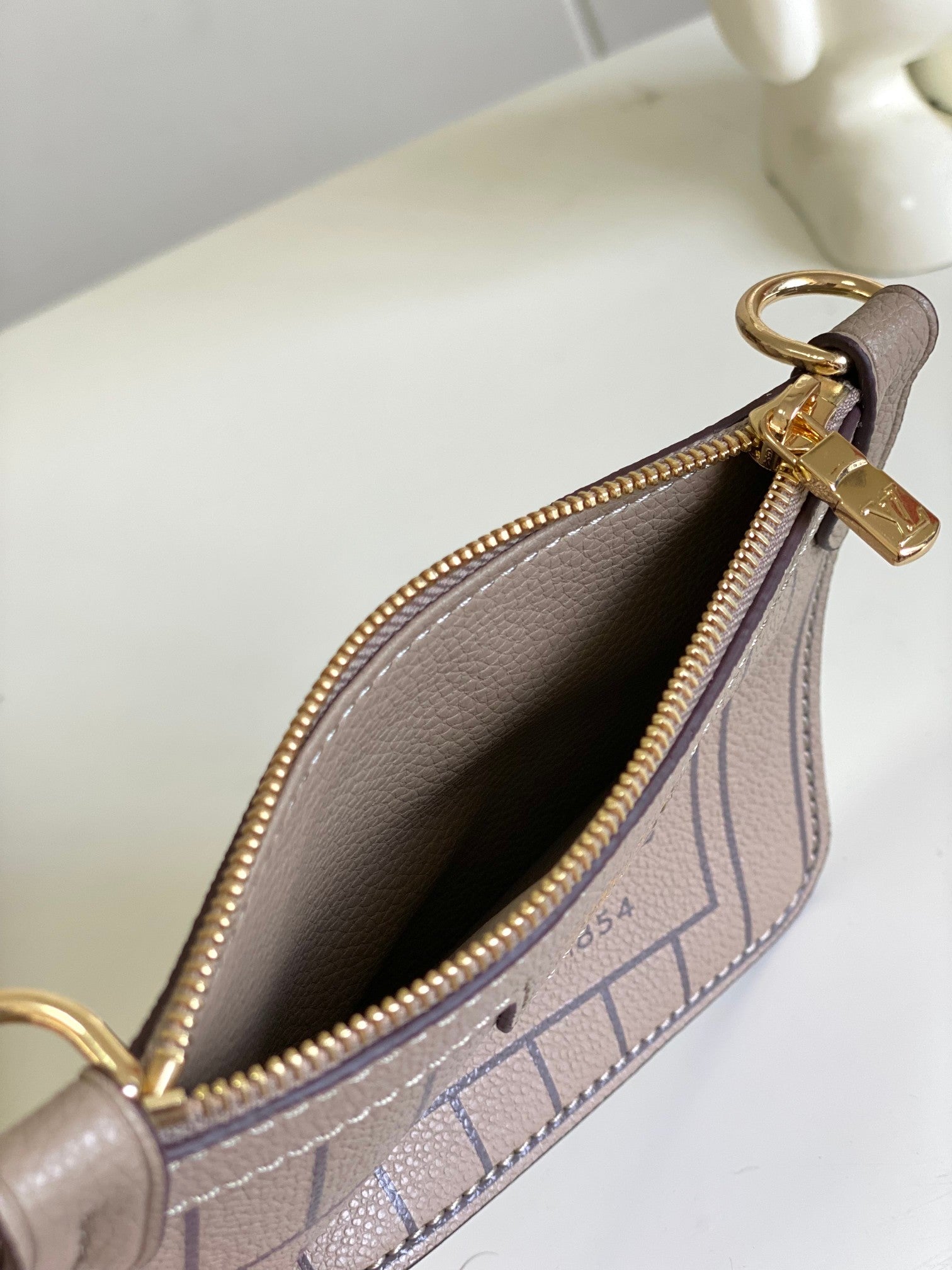 Louis Vuitton Classic Taupe Leather Bucket Bag with Top Handle and Strap