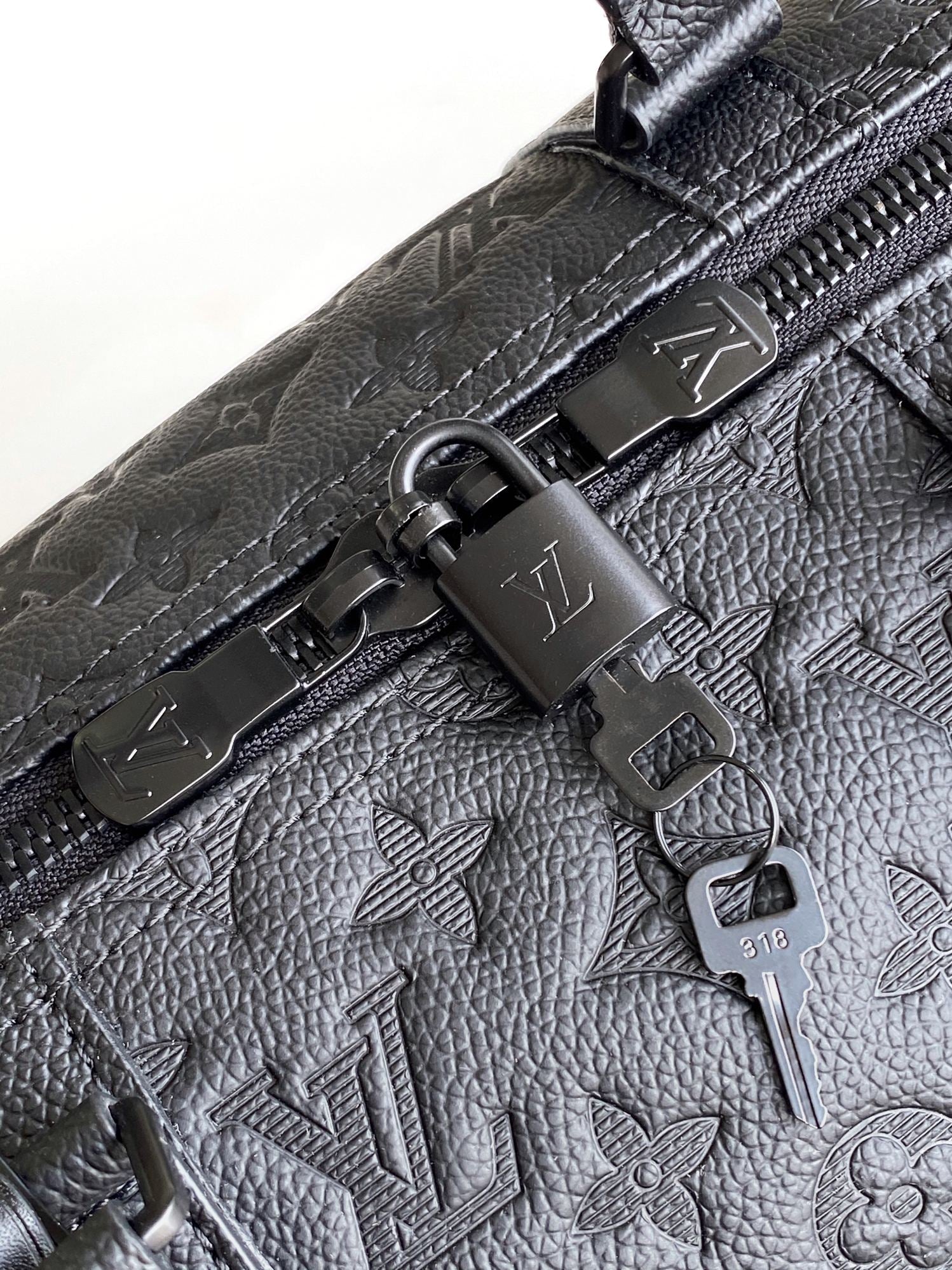 Louis Vuitton Luxury Black Embossed Leather Weekender Duffle Travel Bag