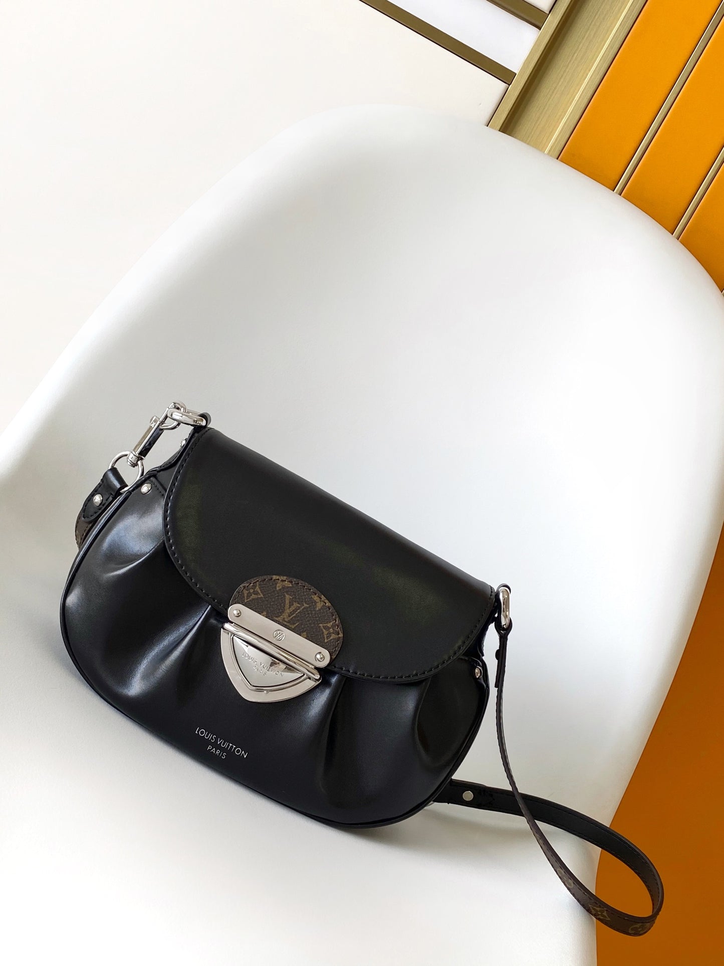 Louis Vuitton Classic Black Leather Shoulder Bag with Flap and Metallic Clasp