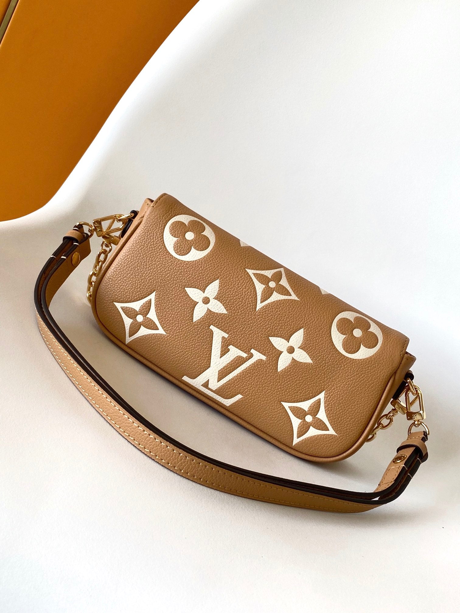 Louis Vuitton Elegant Beige Monogram Leather Crossbody Bag with Gold Chain