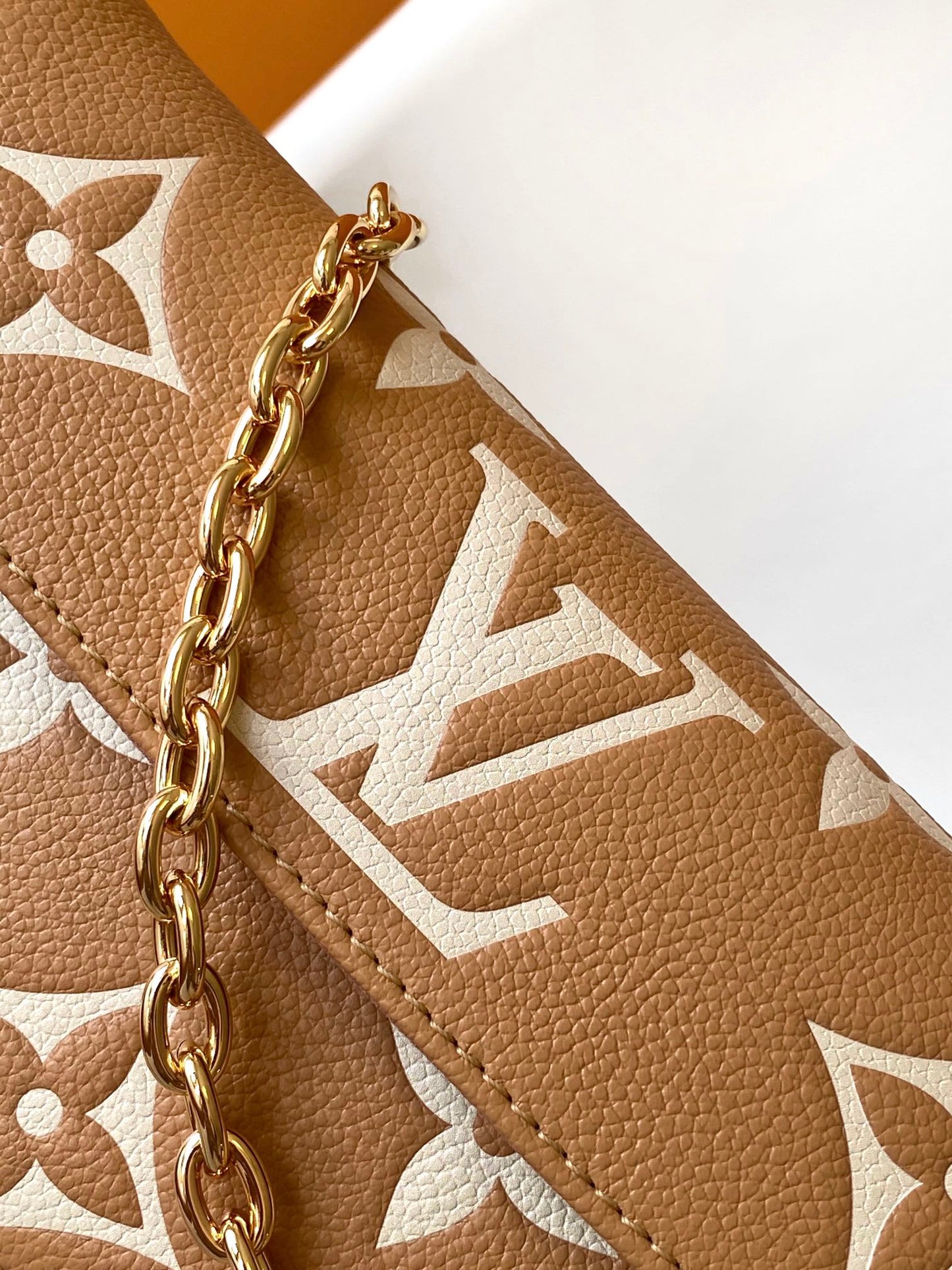 Louis Vuitton Elegant Beige Monogram Leather Crossbody Bag with Gold Chain