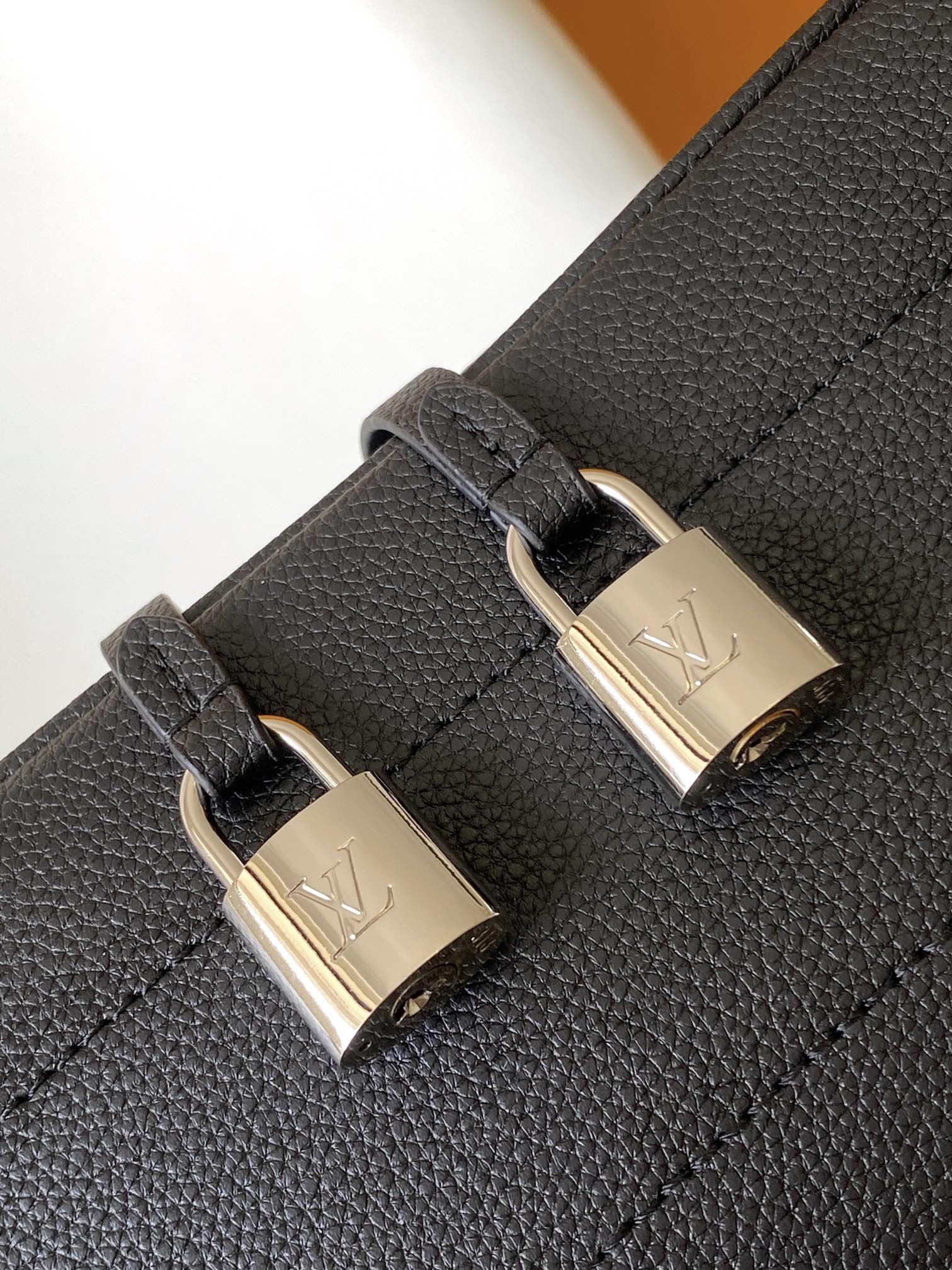 Louis Vuitton Classic Black Embossed Monogram Bucket Bag with Drawstring