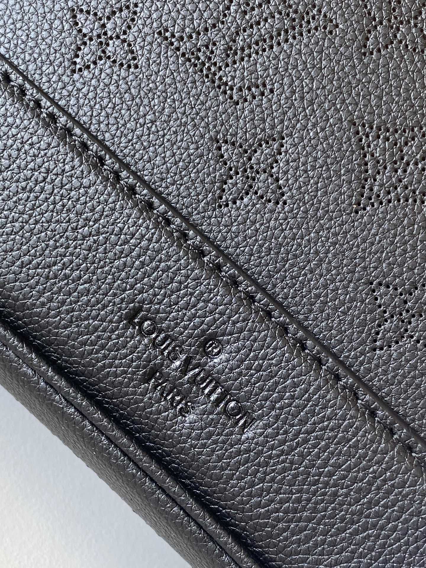 Louis Vuitton Classic Black Embossed Monogram Bucket Bag with Drawstring