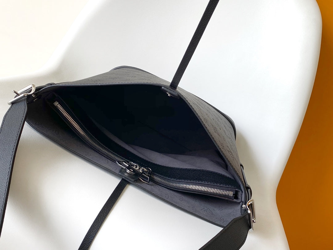 Louis Vuitton Classic Black Embossed Monogram Bucket Bag with Drawstring