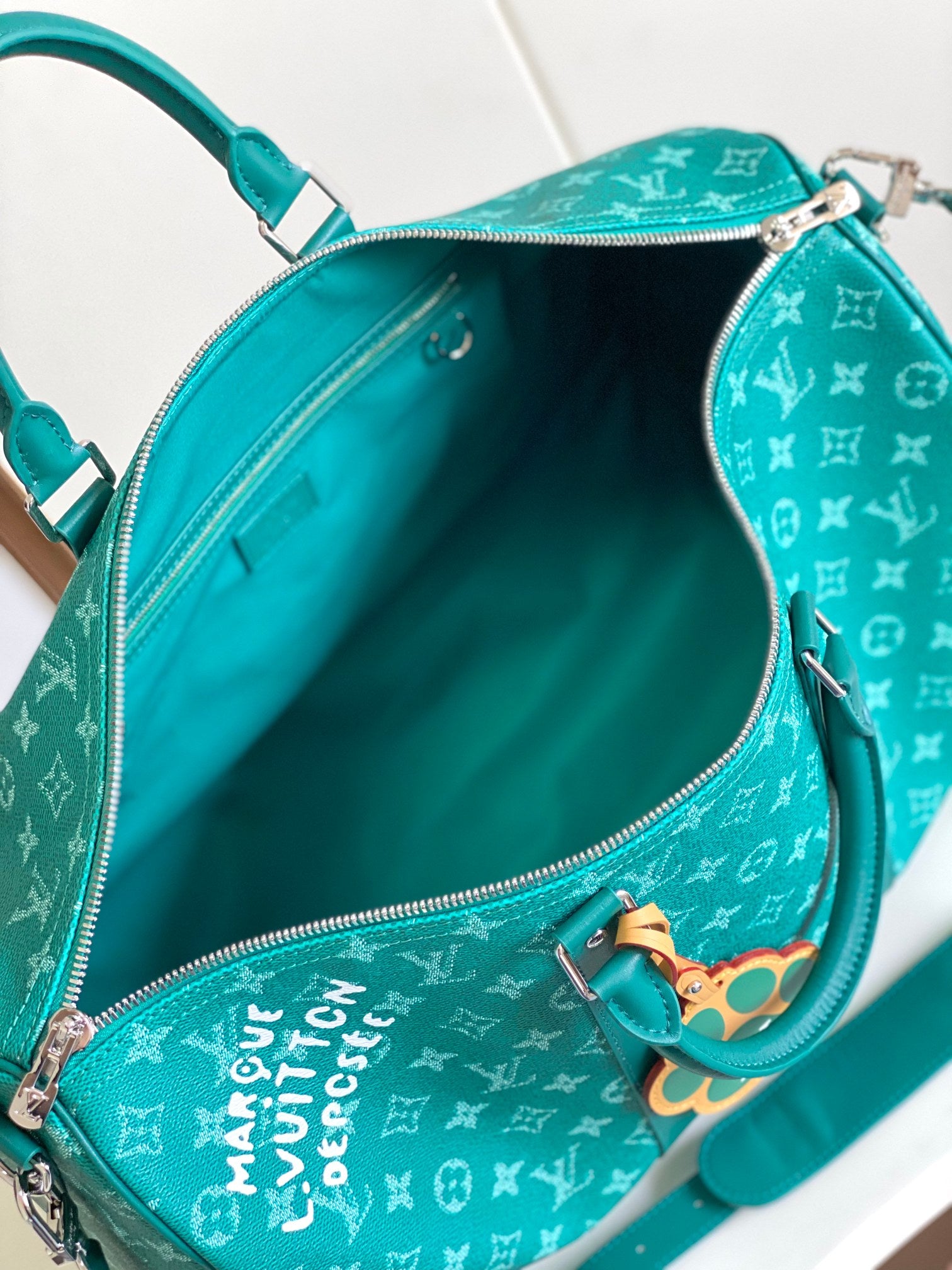Louis Vuitton Green Monogram Pattern Travel Duffle Bag with Dog Paw Charm
