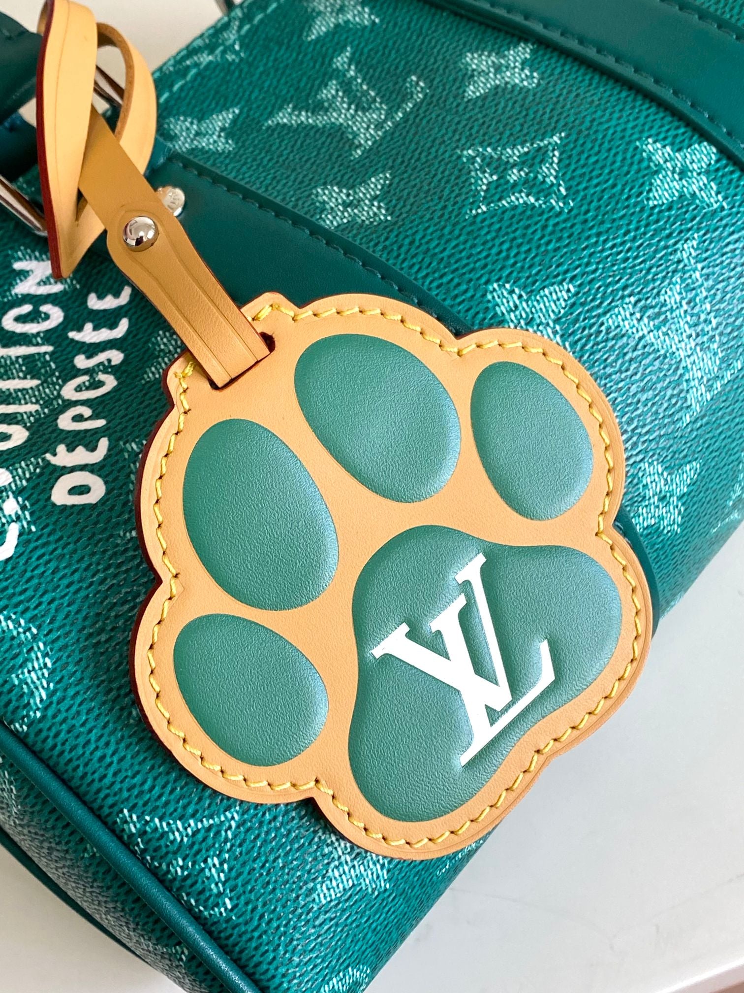 Louis Vuitton Luxury Green Monogram Mini Duffle Bag with Paw Print Charm
