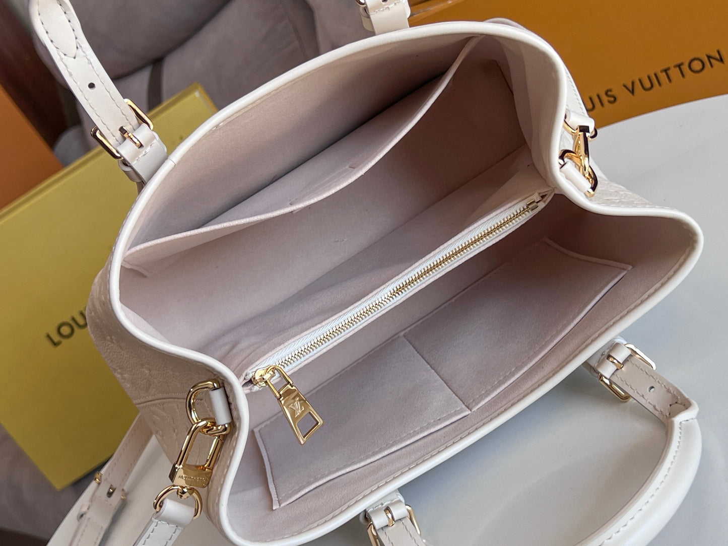 Louis Vuitton Elegant Cream Beige Embossed Leather Tote Bag with Top Handles