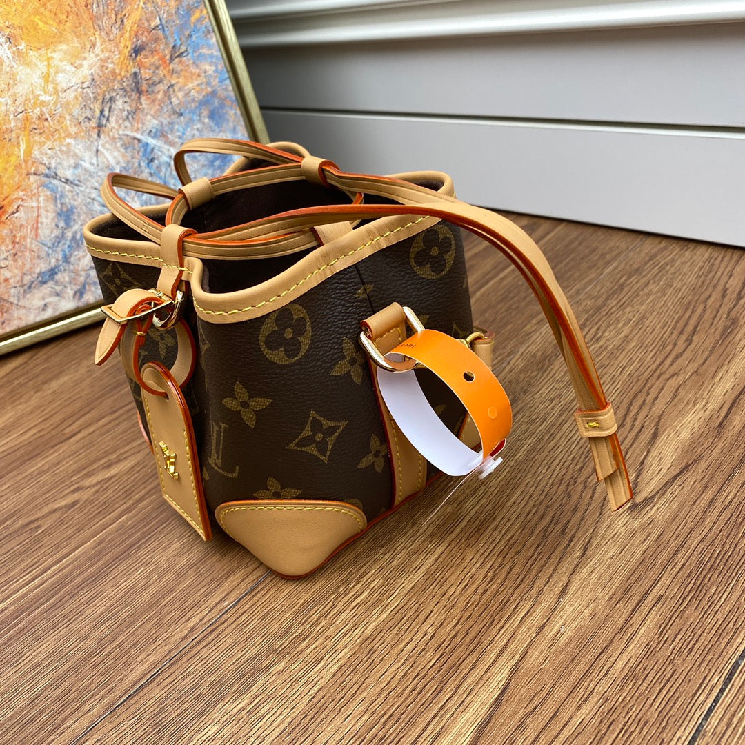 Louis Vuitton Classic Monogram Mini Bucket Bag with Leather Crossbody Strap