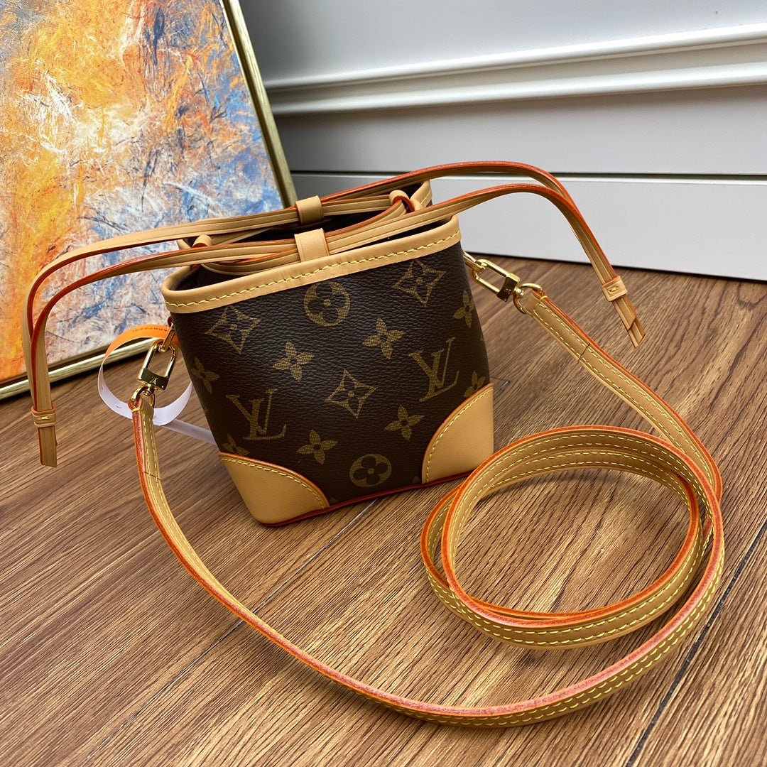 Louis Vuitton Classic Monogram Mini Bucket Bag with Leather Crossbody Strap