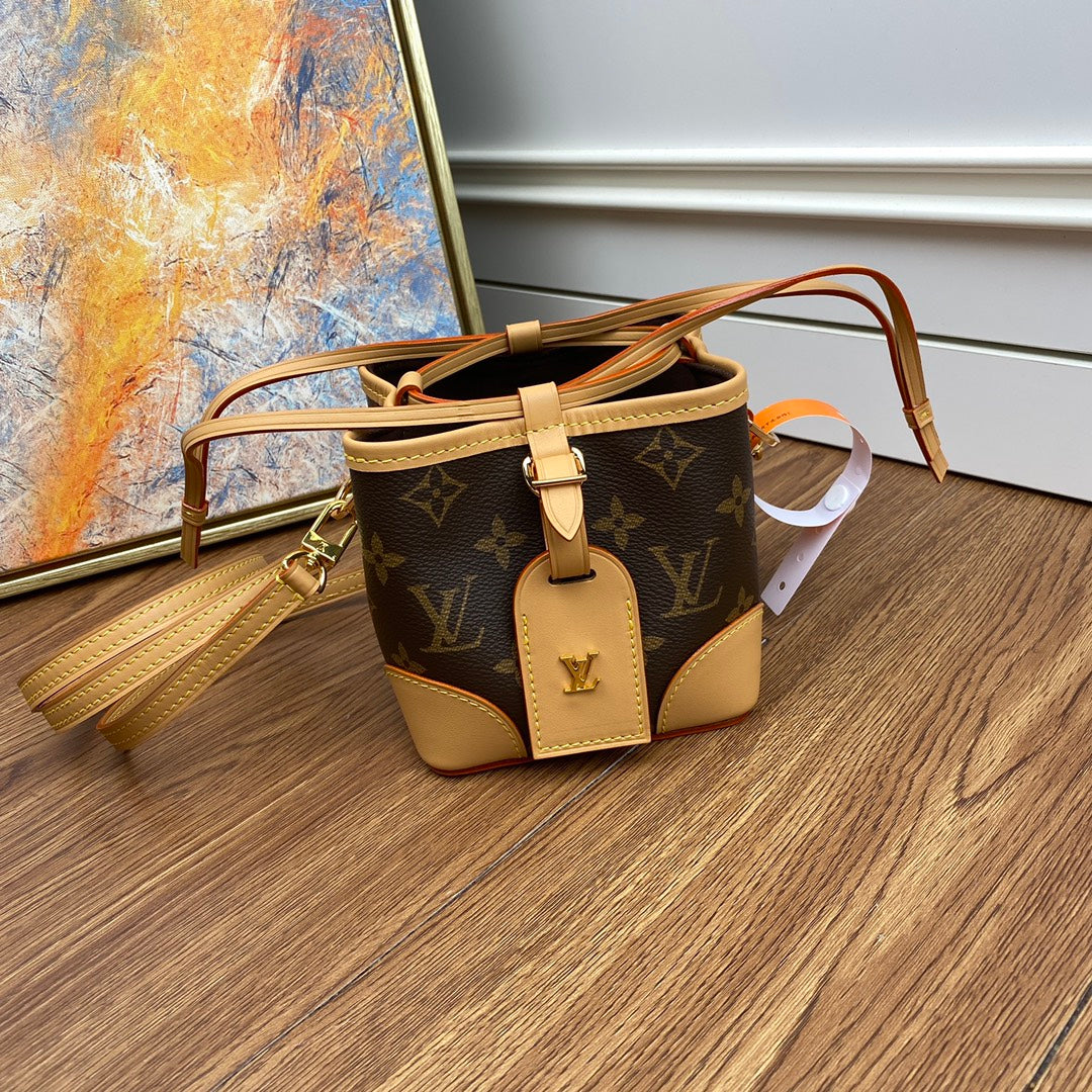 Louis Vuitton Classic Monogram Mini Bucket Bag with Leather Crossbody Strap