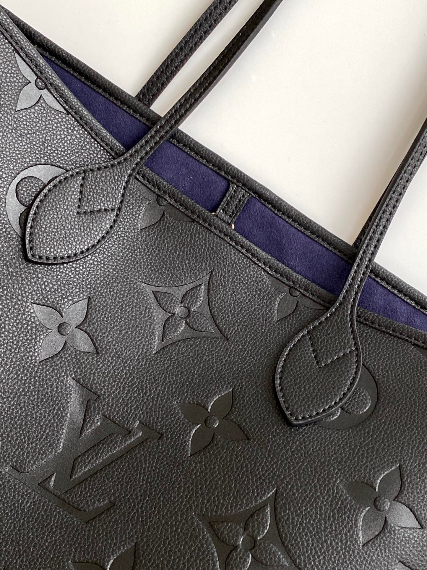 Louis Vuitton Elegant Black Embossed Leather Tote Bag with Double Handles