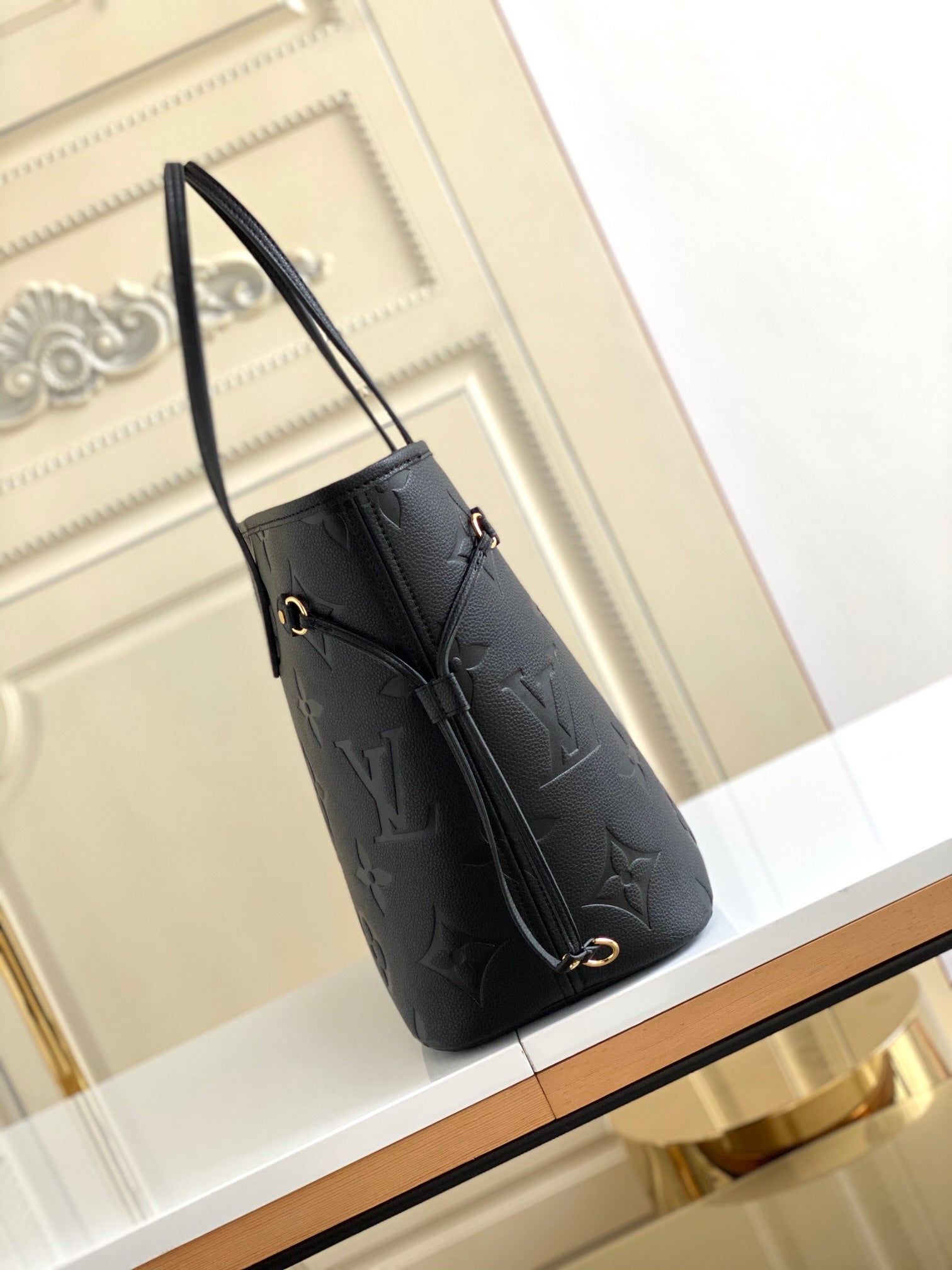 Louis Vuitton Elegant Black Embossed Leather Tote Bag with Double Handles