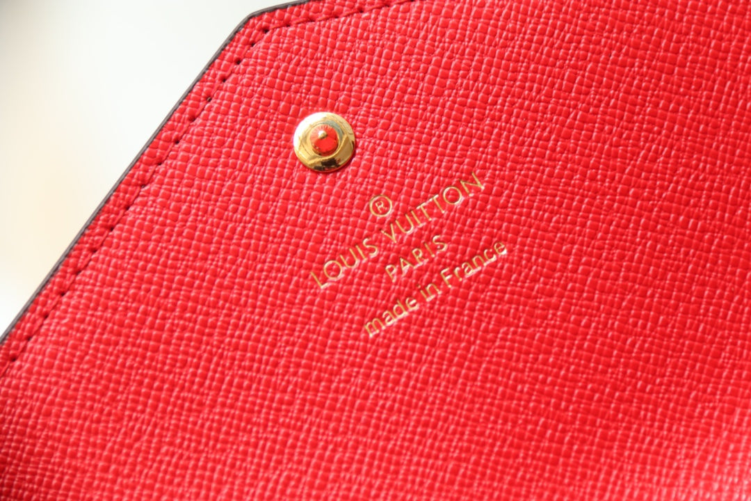 Louis Vuitton Elegant Brown Monogram Canvas Envelope Wallet with Snap Closure