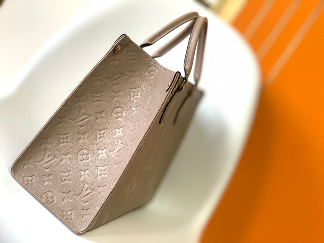 Louis Vuitton Elegant Taupe Embossed Leather Tote Bag with Top Handles