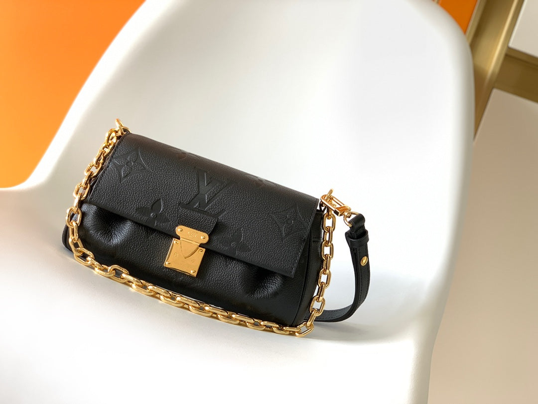 Louis Vuitton Elegant Black Embossed Leather Flap Bag with Gold Chain