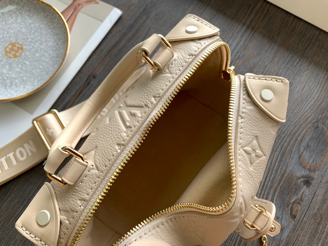 Louis Vuitton Beige Embossed Leather Trunk Bag with Wide Strap and Chain