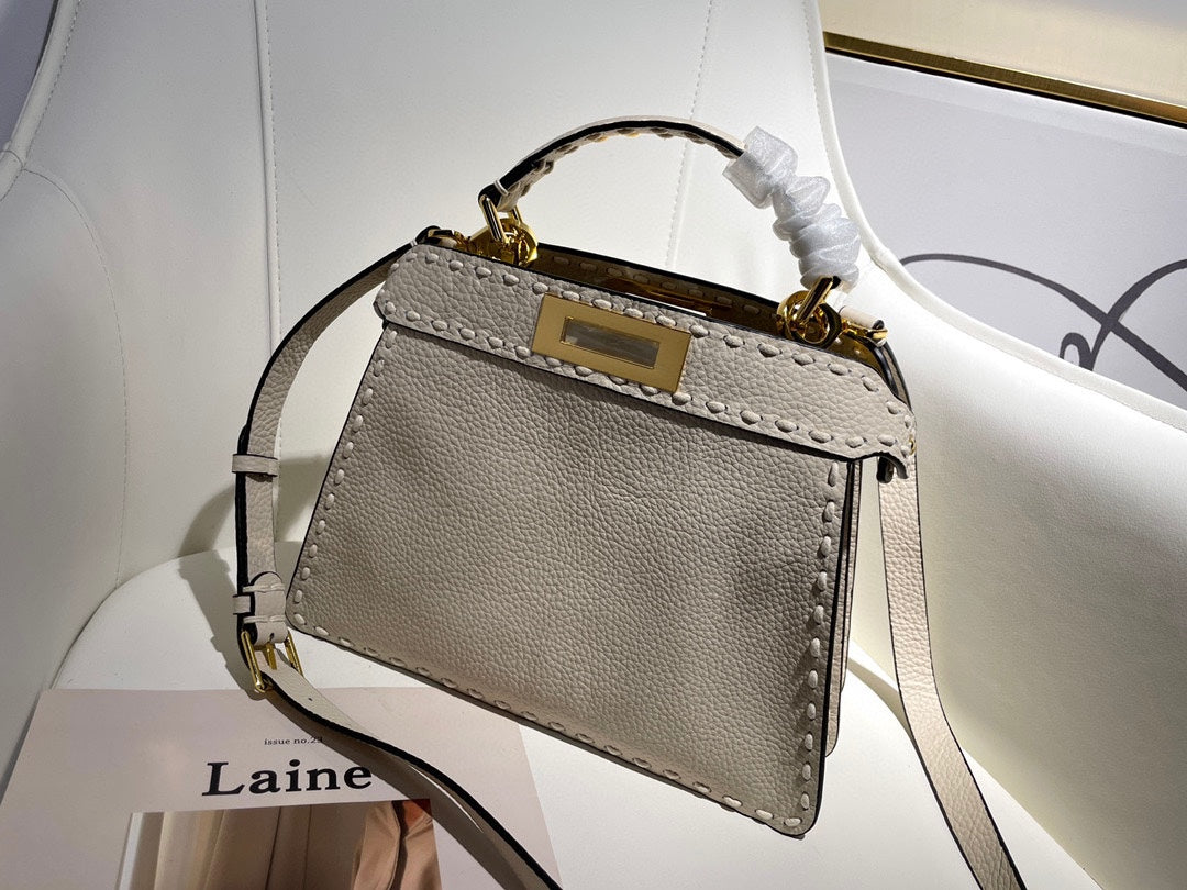 Elegant White Leather Top Handle Crossbody Bag with Gold-Tone Hardware