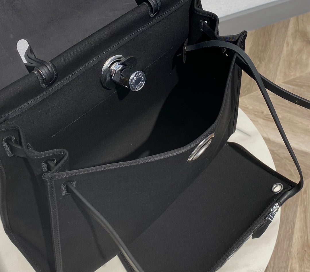 Elegant Black Structured Top-Handle Handbag - Versatile Satchel with Shoulder Strap
