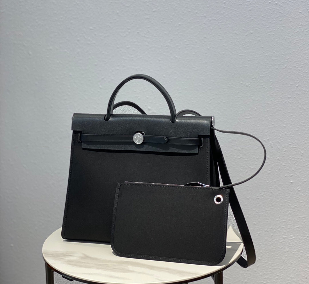 Elegant Black Structured Top-Handle Handbag - Versatile Satchel with Shoulder Strap
