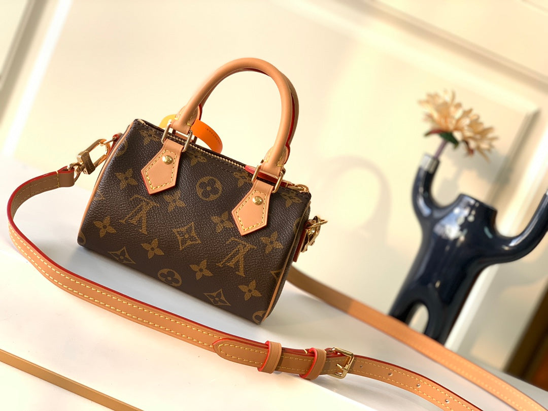 Louis Vuitton Classic Brown Monogram Mini Barrel Handbag with Leather Strap