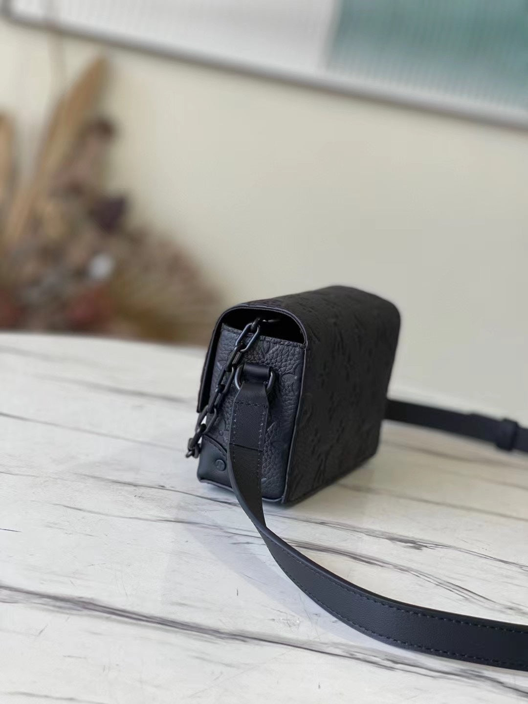 Louis Vuitton Matte Black Embossed Leather Crossbody Bag with Chain Detail