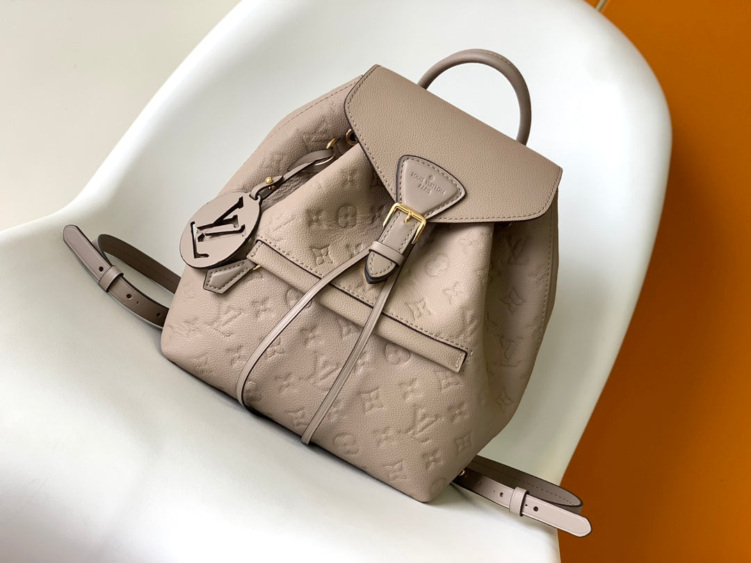 Louis Vuitton Elegant Taupe Embossed Leather Mini Backpack with Flap Closure