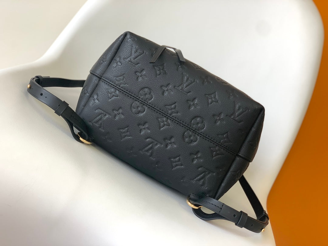 Louis Vuitton Elegant Black Embossed Leather Small Backpack with Flap Closure