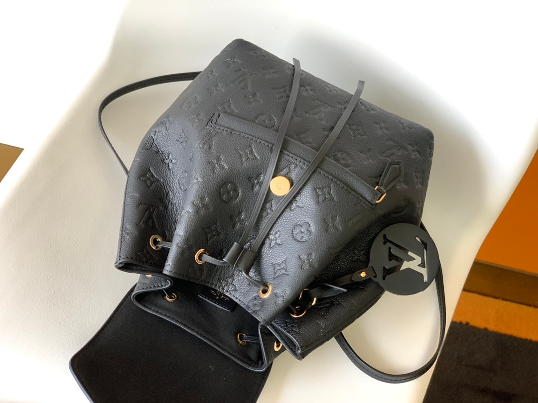 Louis Vuitton Elegant Black Embossed Leather Small Backpack with Flap Closure