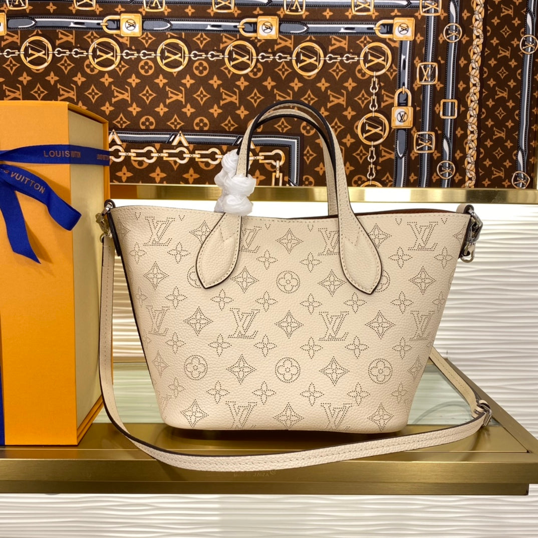 Louis Vuitton Luxury Cream Perforated Leather Tote Bag with Round Charm
