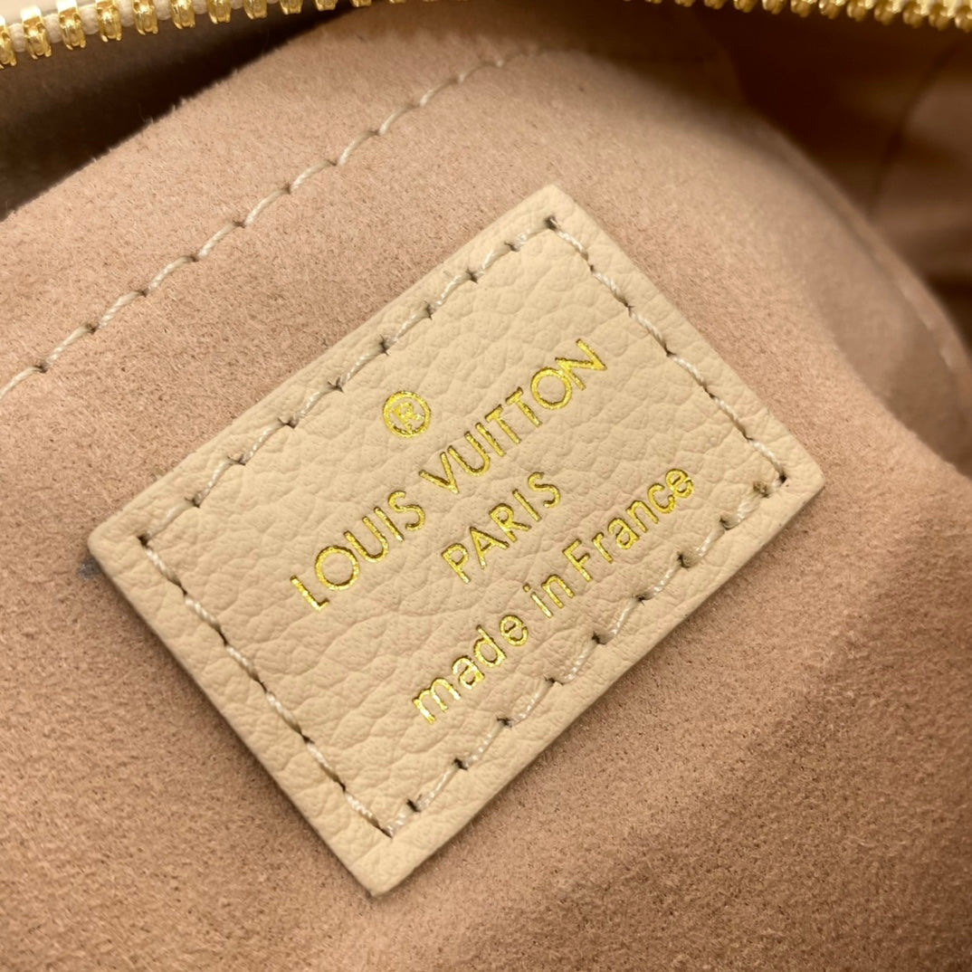 Louis Vuitton Cream and Pink Monogram Embossed Leather Mini Duffle Handbag