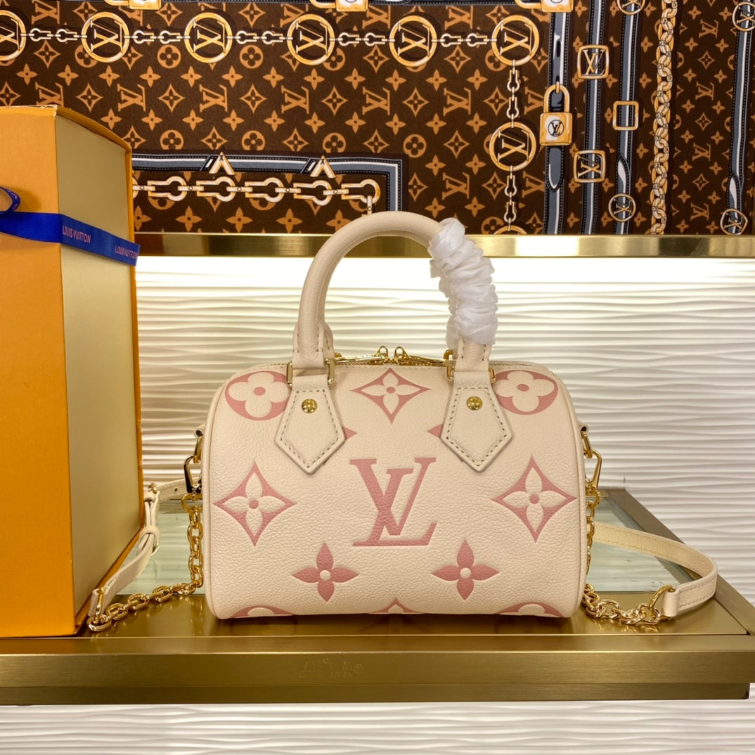 Louis Vuitton Cream and Pink Monogram Embossed Leather Mini Duffle Handbag