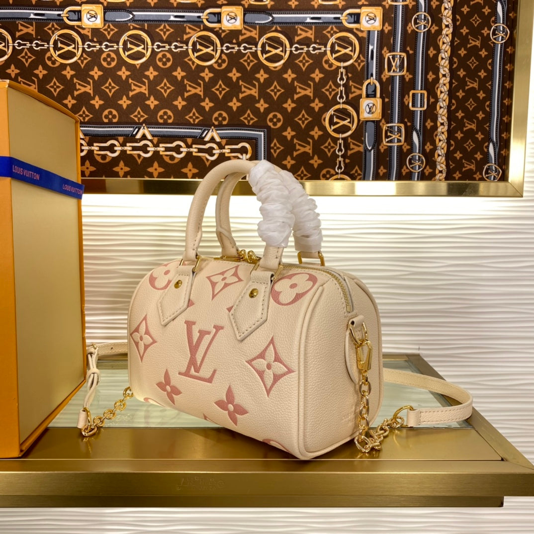 Louis Vuitton Cream and Pink Monogram Embossed Leather Mini Duffle Handbag