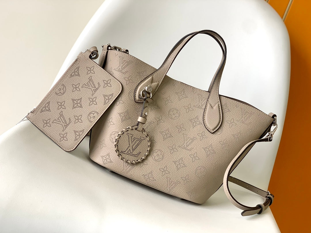 Louis Vuitton Elegant Taupe Perforated Leather Tote Handbag with Charm