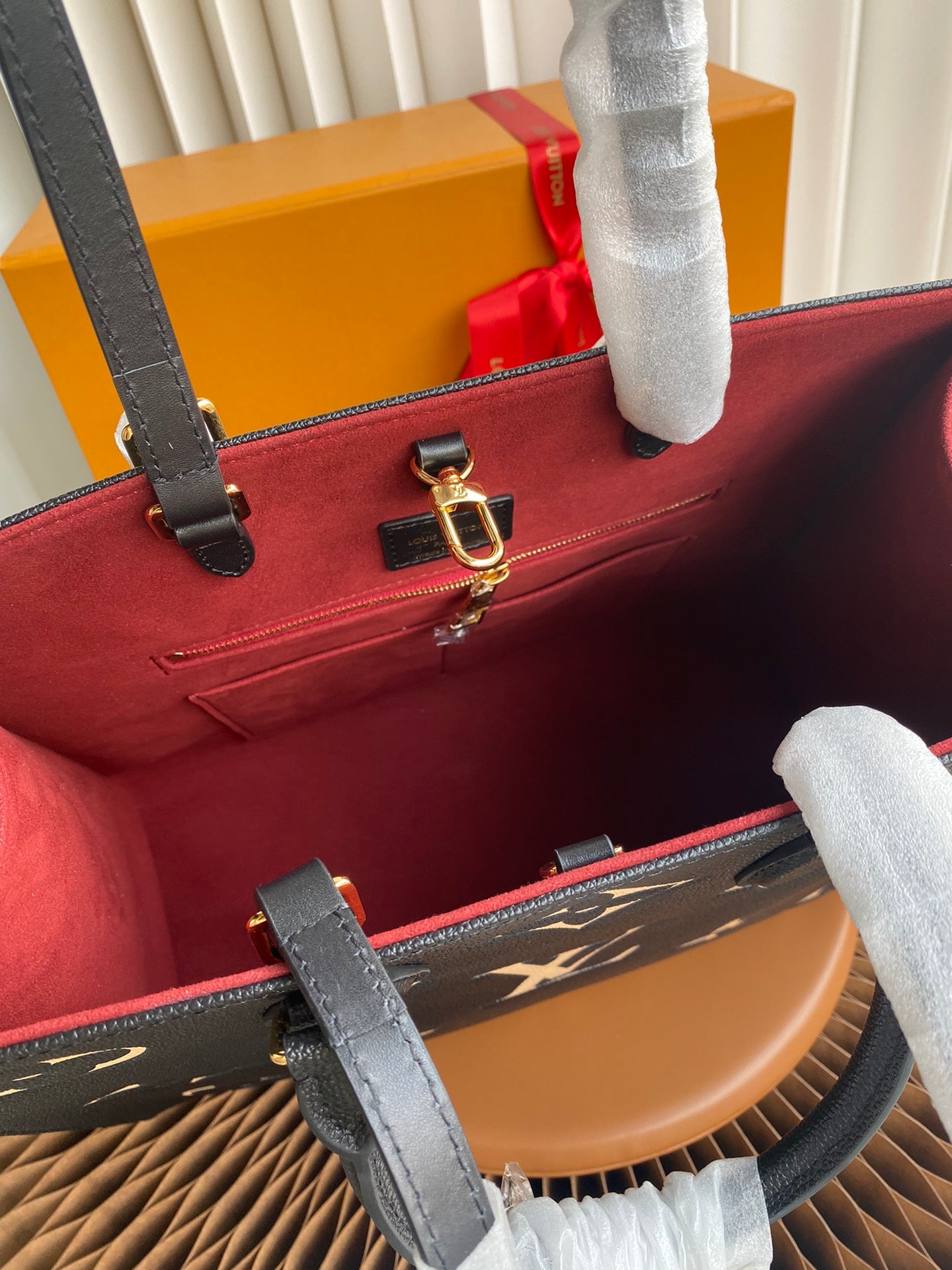 Louis Vuitton Luxury Black Leather Tote Bag with Gold Monogram Pattern