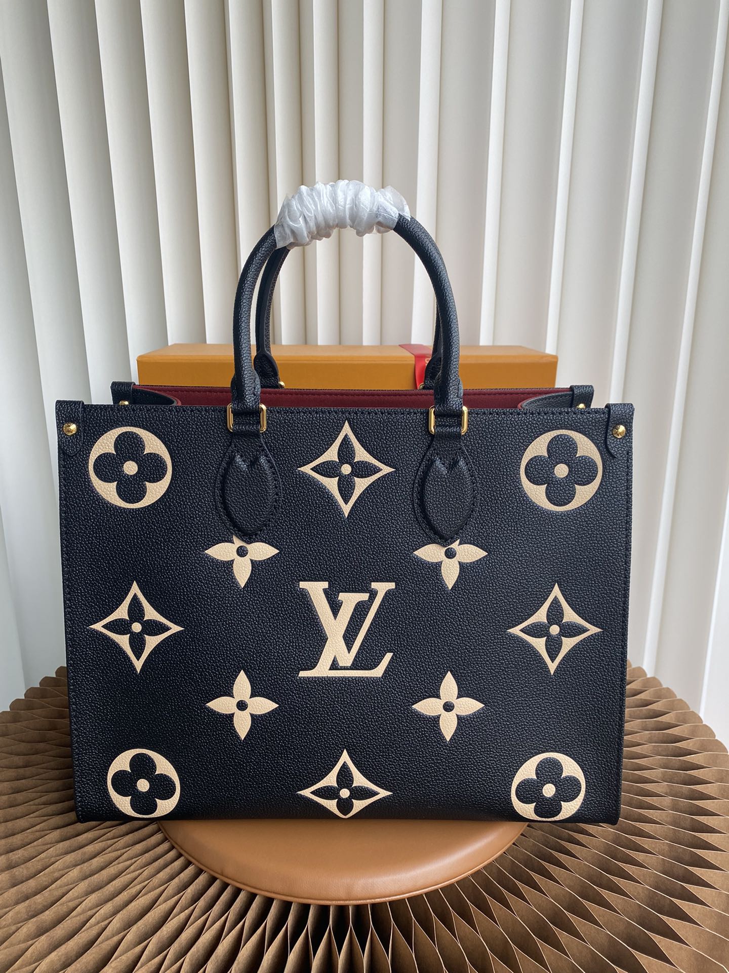 Louis Vuitton Luxury Black Leather Tote Bag with Gold Monogram Pattern