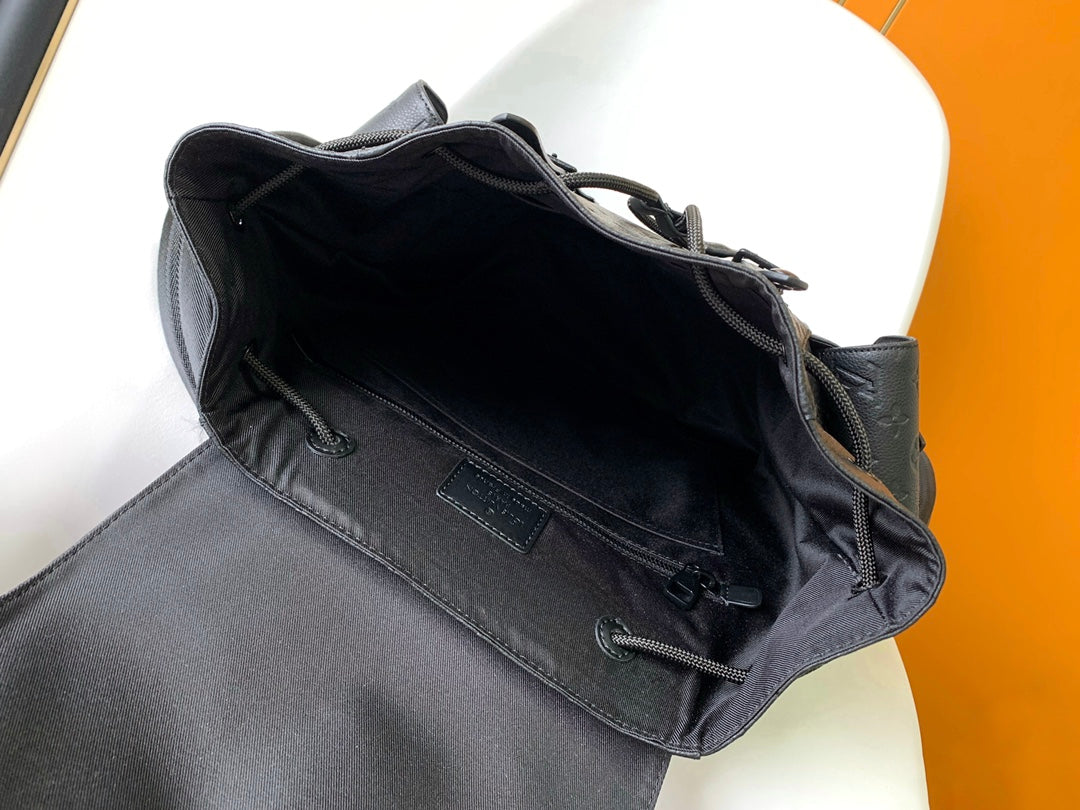 Louis Vuitton Luxury Black Embossed Leather Backpack with Side Pockets
