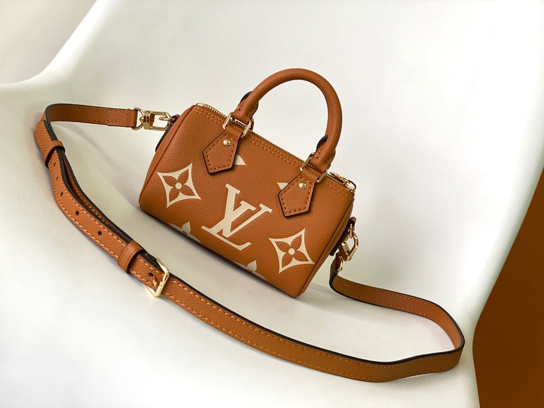Louis Vuitton Classic Tan Monogram Mini Duffle Handbag with Adjustable Shoulder Strap