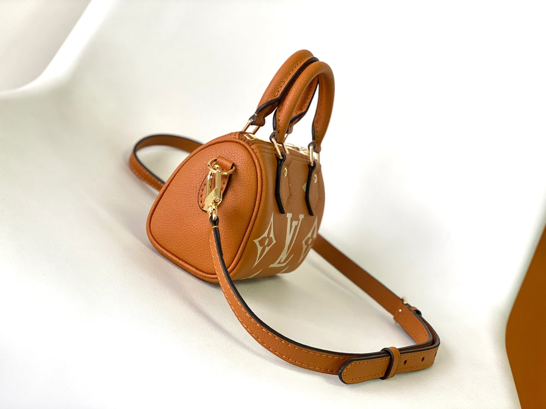 Louis Vuitton Classic Tan Monogram Mini Duffle Handbag with Adjustable Shoulder Strap