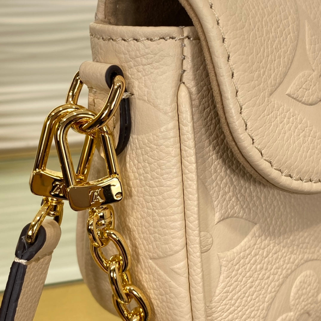 Louis Vuitton Elegant Beige Embossed Leather Shoulder Bag with Gold Chain