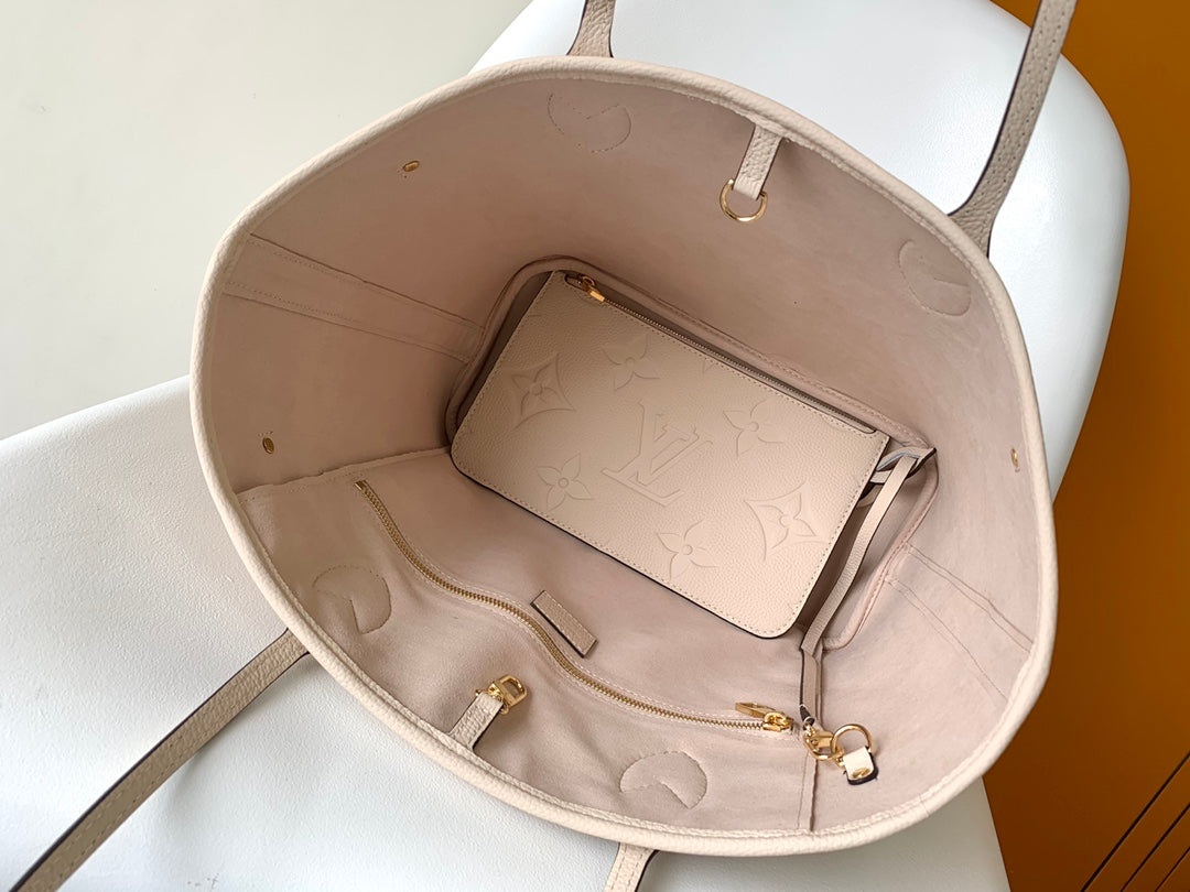 Louis Vuitton Elegant Beige Embossed Leather Tote Bag with Side Drawstrings