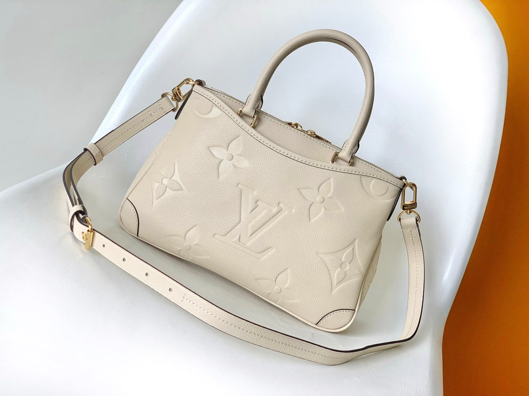 Louis Vuitton Classic Cream Embossed Textured Leather Top Handle Handbag