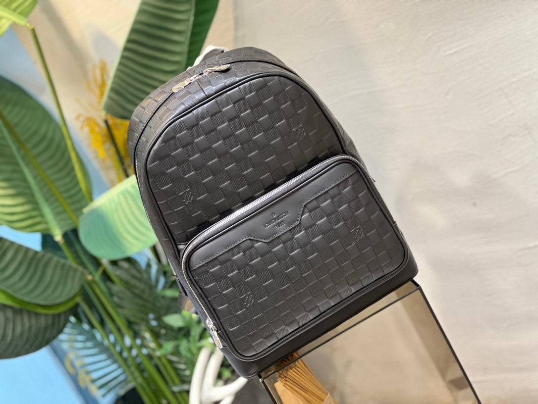 Louis Vuitton Black Woven Leather Texture Unisex Backpack with Zip Front Pocket