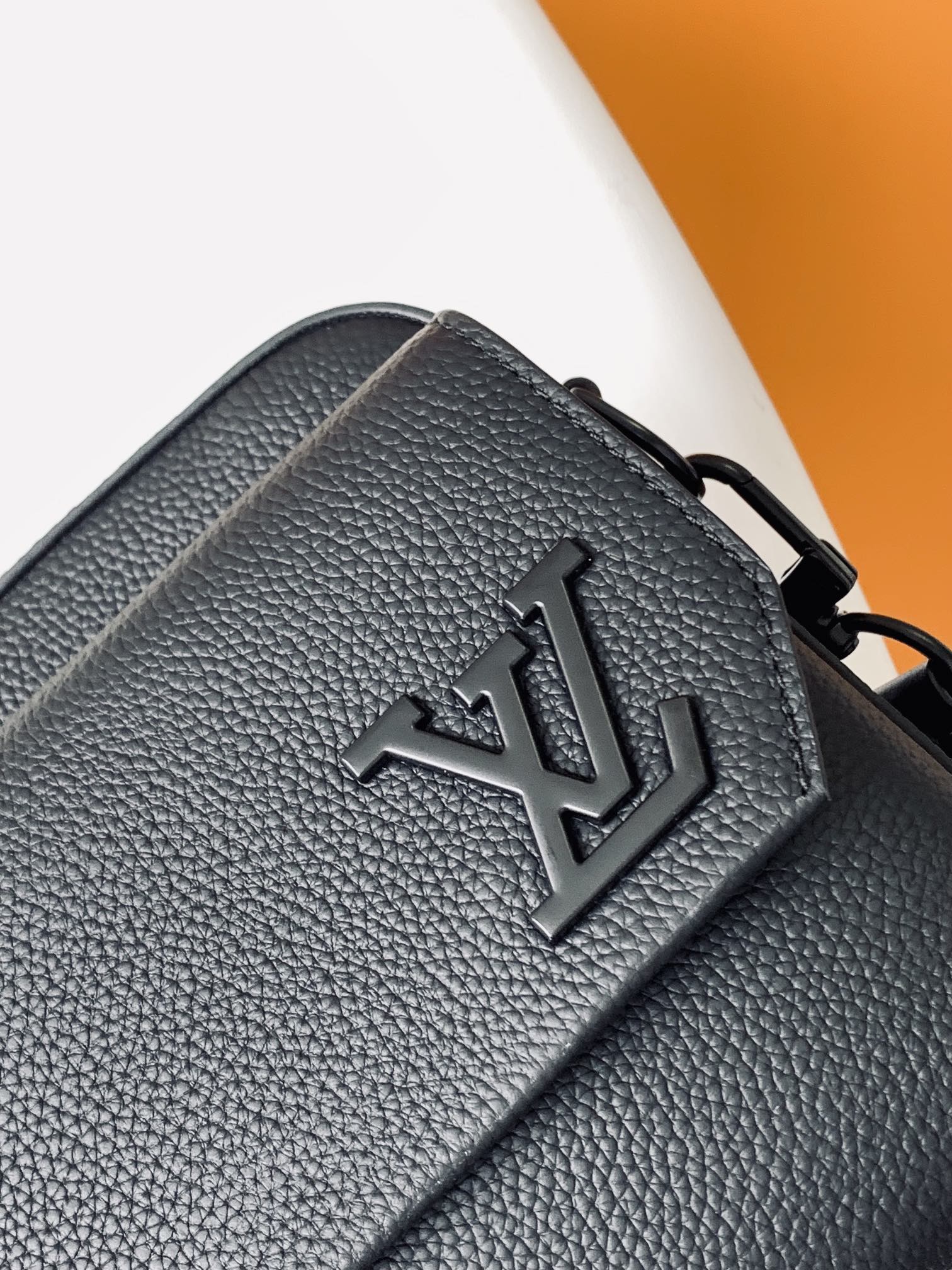 Louis Vuitton Minimalist Black Leather Crossbody Bag with Wide Adjustable Strap