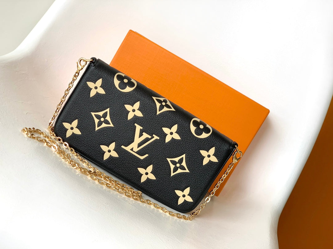 Louis Vuitton Elegant Black Chain Shoulder Bag with Gold Monogram Print