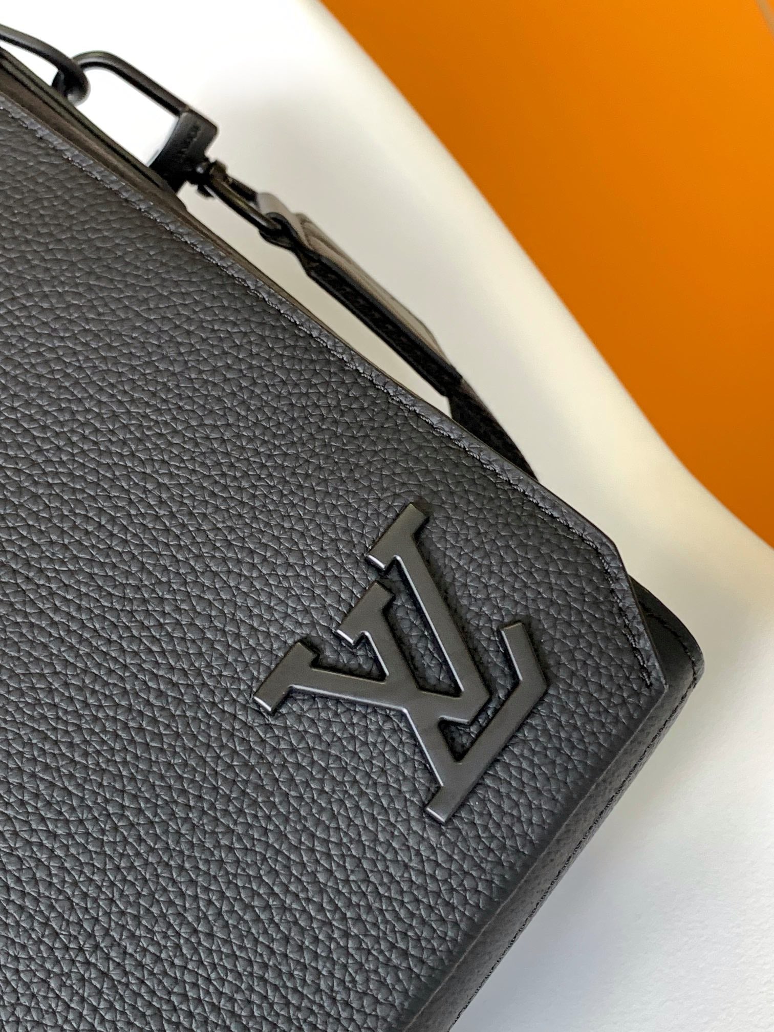 Louis Vuitton Minimalist Black Leather Messenger Bag with Wide Crossbody Strap