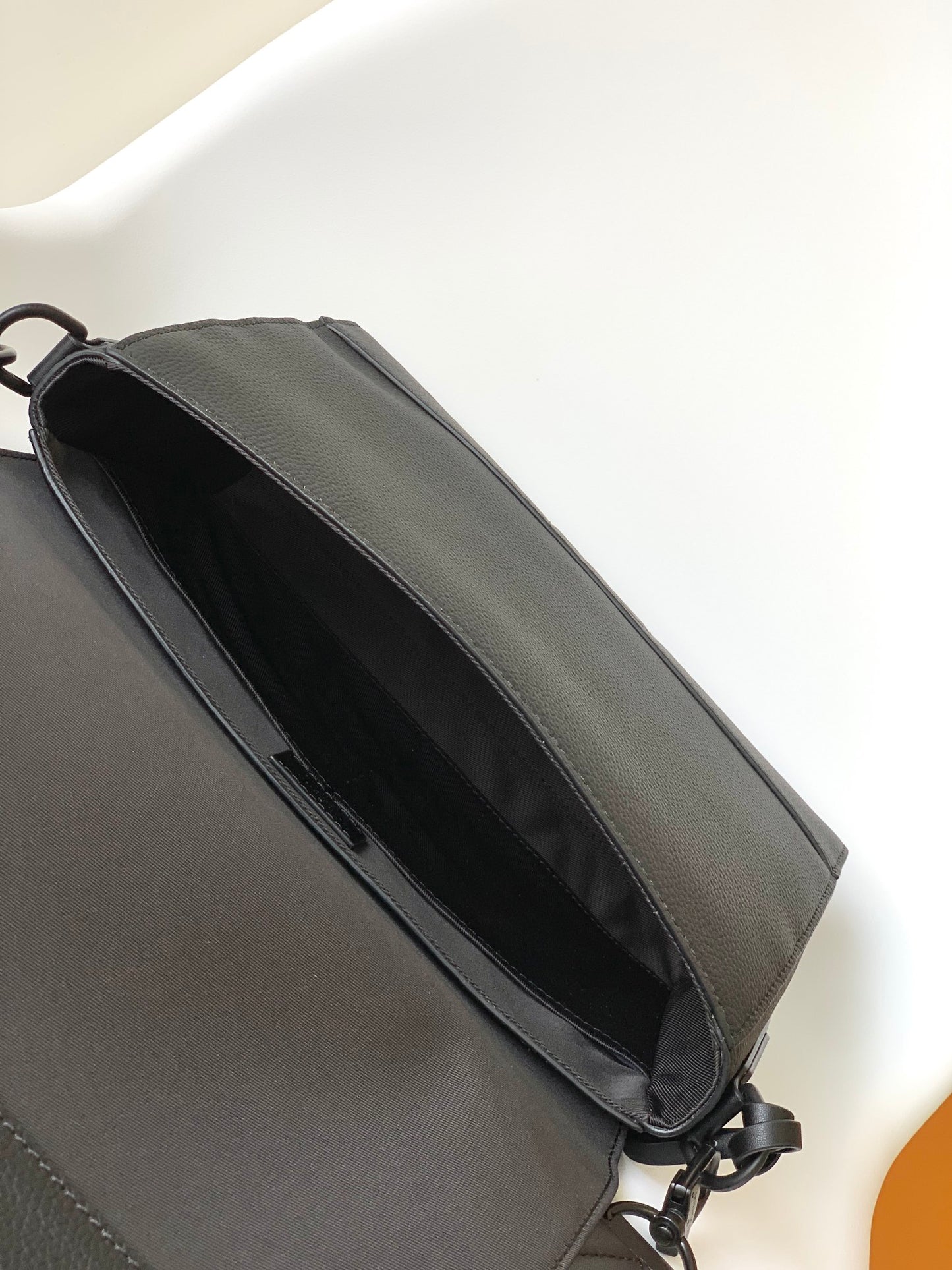 Louis Vuitton Minimalist Black Leather Messenger Bag with Wide Crossbody Strap