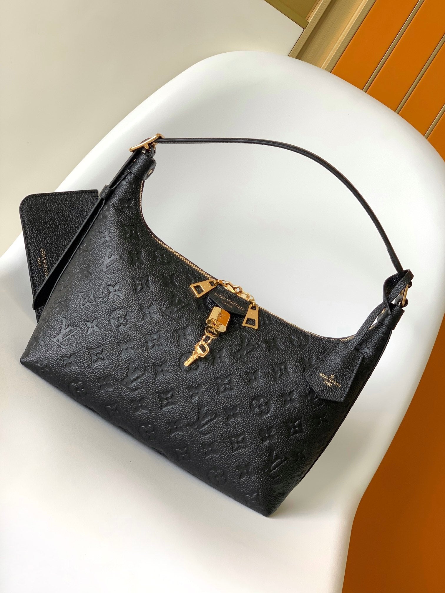 Louis Vuitton Classic Black Embossed Leather Shoulder Bag with Gold Hardware